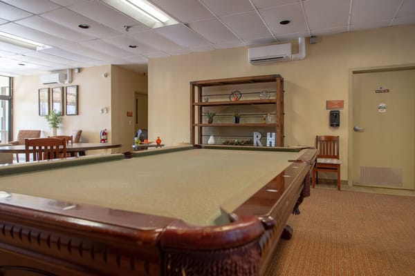 Pool table in a common area of the facility