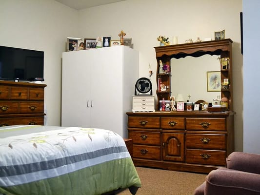 Private resident room with furniture and decor