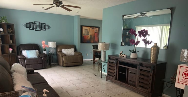 Bright common area with comfortable seating and decor