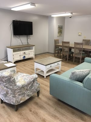 Common area with seating and dining table