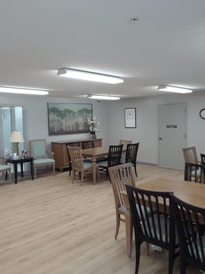 Interior view of a common area with tables and chairs