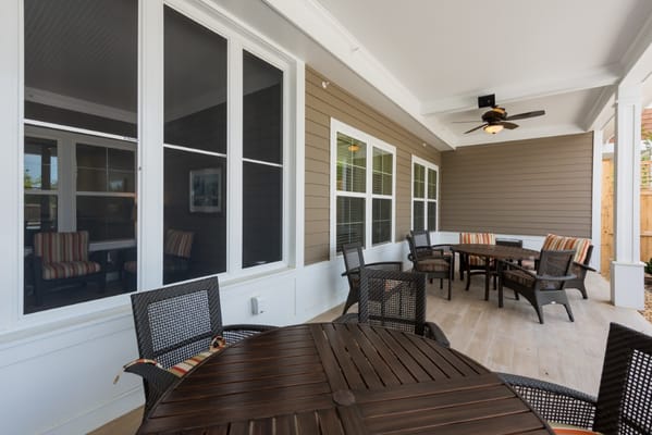 Outdoor patio area with seating and tables