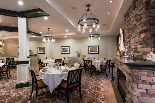 Elegant dining area with tables set for meals
