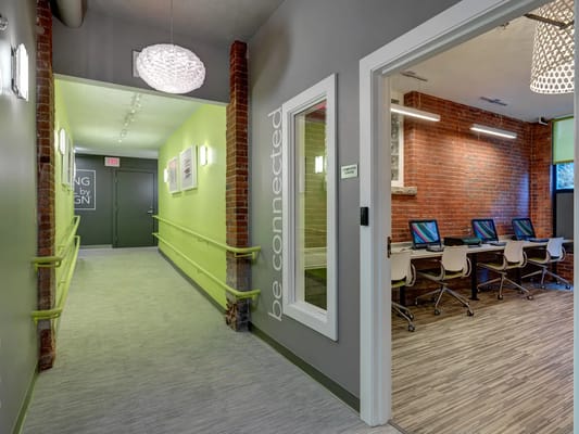 Interior corridor leading to a common area