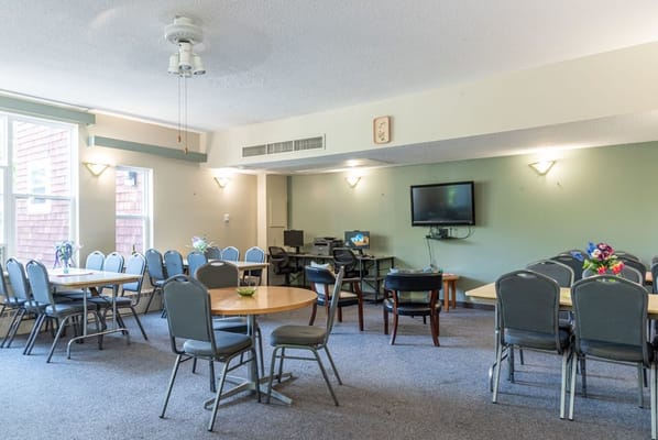 Seating area with tables in a common space
