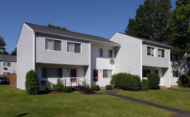 Exterior view of a residential building with landscaping