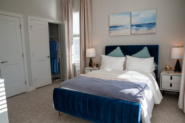 Well-furnished private resident bedroom with natural lighting