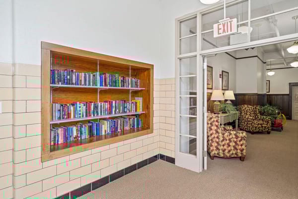 Interior view of a common area with bookshelves