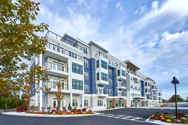 Exterior view of The Current South Shore with landscaping