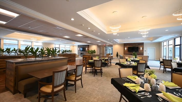 Elegant dining room with tables set for meals