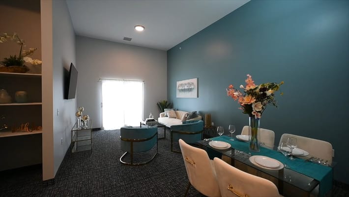 Interior view of a modern common area with dining table