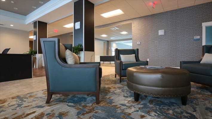 Modern seating area in a senior living facility lobby