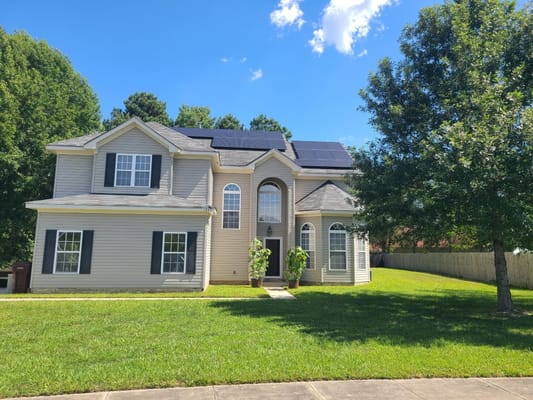 Exterior view of a residential home with solar panels