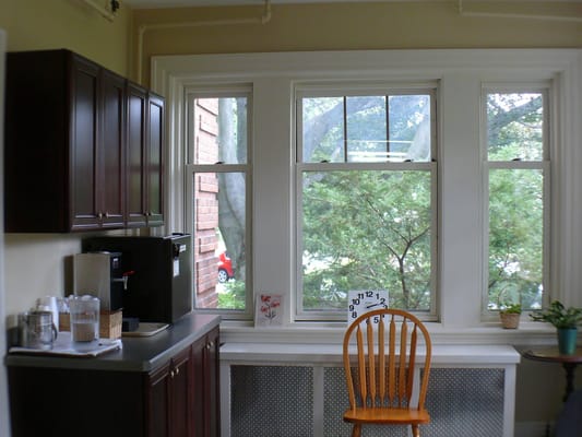 Interior view of a kitchen area with windows