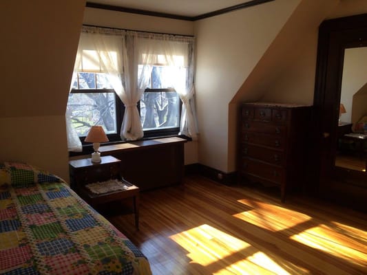 Cozy resident room with a bed and window