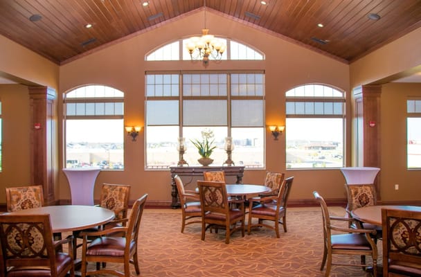 Interior view of a common area with tables and chairs