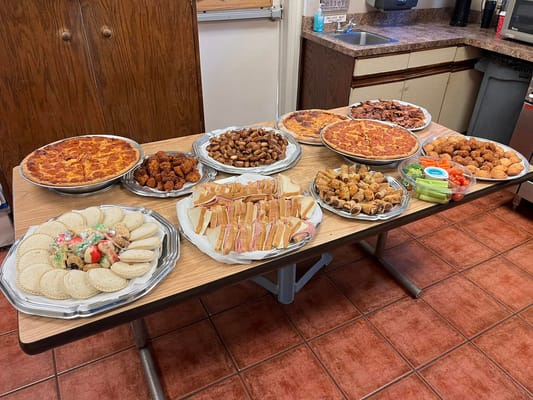 A variety of food platters on a dining table