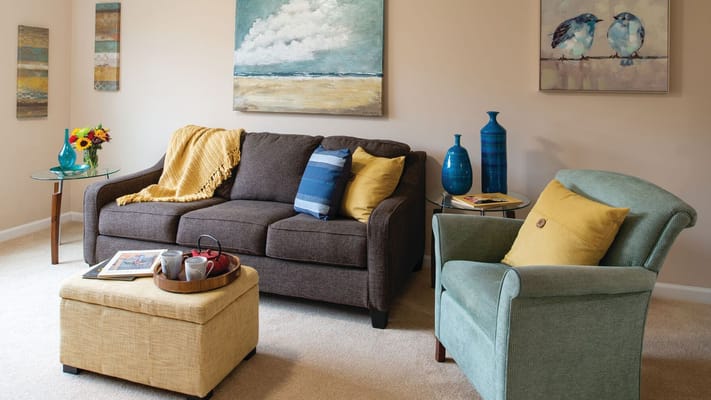 Cozy seating area in a bright common room