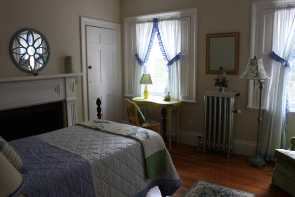 Cozy resident room with a bed and decorative elements