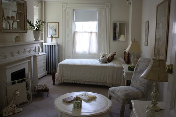 Cozy resident room with light decor and furnishings