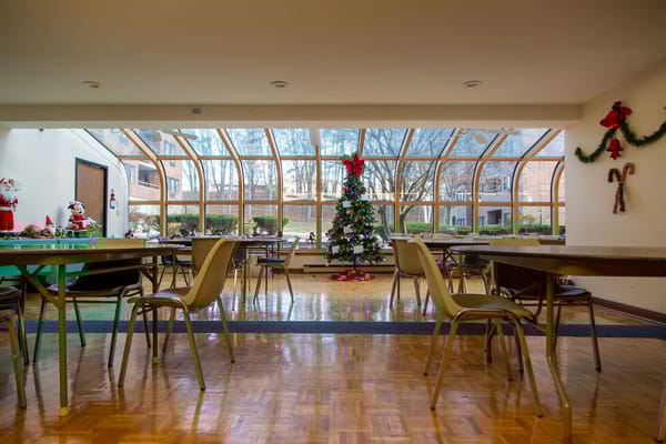 Bright common area decorated for the holidays