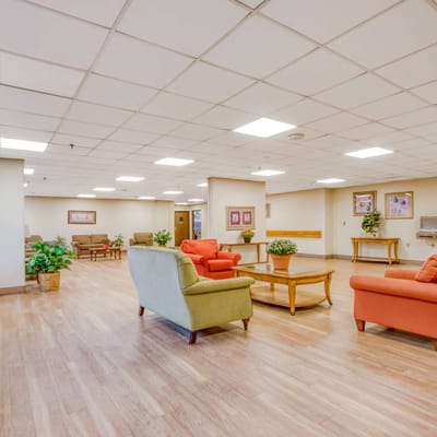 Bright common area with seating and plants