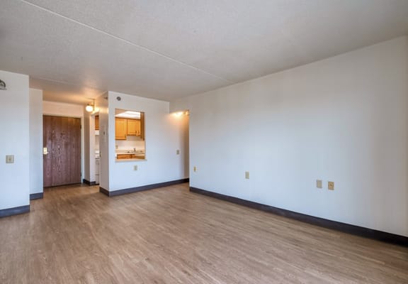 Interior view of a private resident room with kitchenette