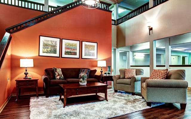 Interior view of a cozy common area with seating