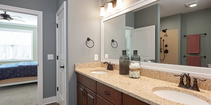 Bright and modern bathroom with dual sinks