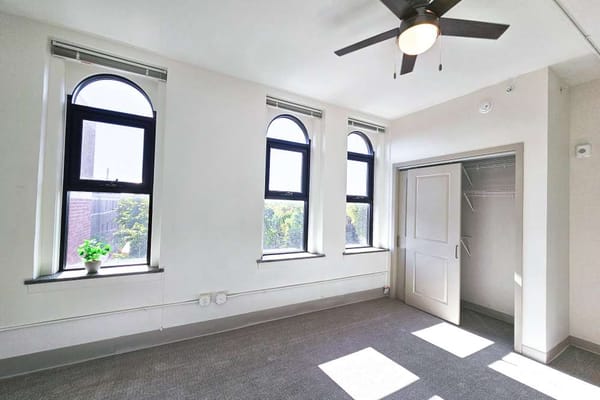 Bright interior of a resident room with windows