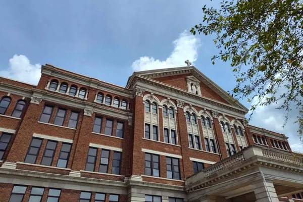 Exterior view of the Academy Manor building