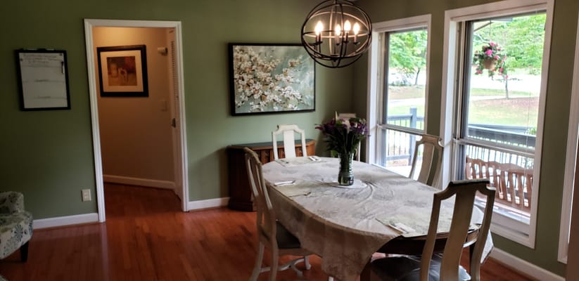 Cozy dining room with a table set for dining