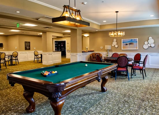 Interior common area with pool table and seating