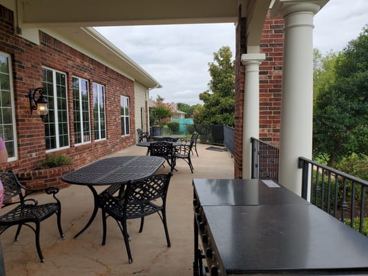 Outdoor seating area on the veranda of Radiance Senior Living.