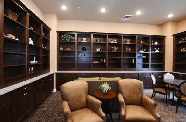 Seating area with bookshelves in Hampton Manor of Brighton