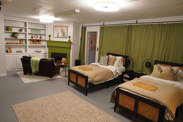 Shared resident room with twin beds and living area
