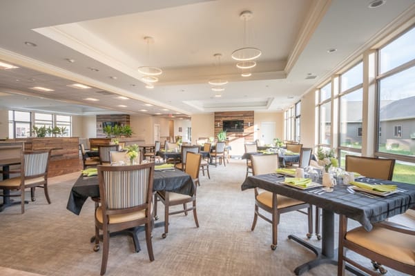 Bright dining area with elegantly set tables