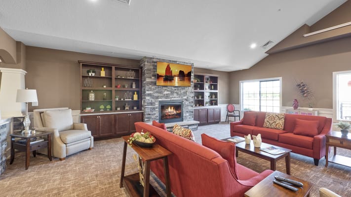 Cozy common area with seating and a fireplace