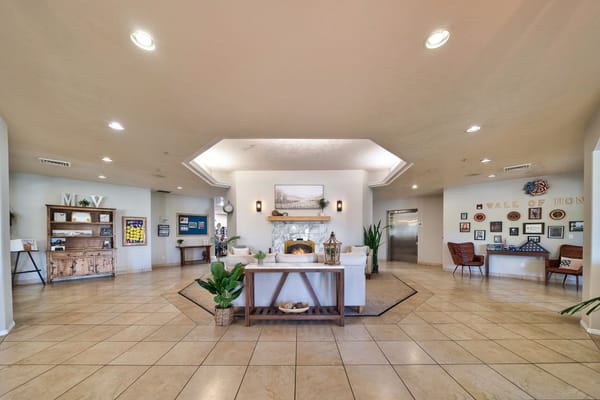 Spacious lobby area with comfortable seating and decor