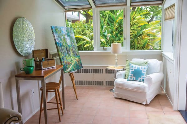 A cozy indoor lounge area with natural light