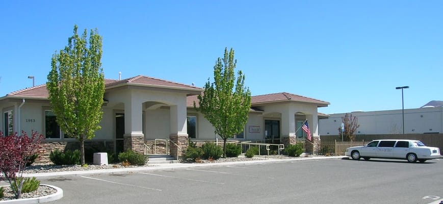 Exterior view of a senior care facility with landscaping