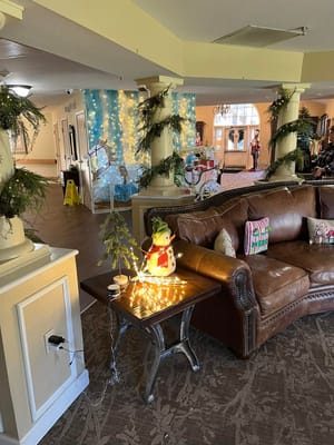 Festively decorated common area with seating