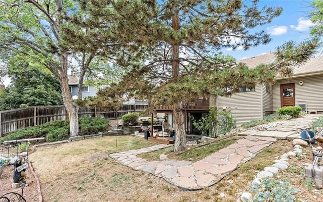 Garden area with stone walkway and trees