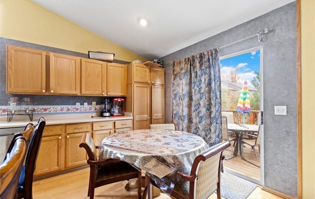 Cozy kitchen dining area with a table and chairs