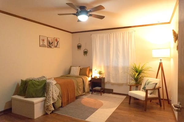 Cozy interior room with bed and seating area