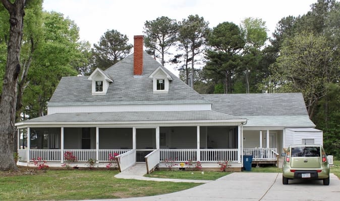 Exterior view of Divine Family Care Homes with porch