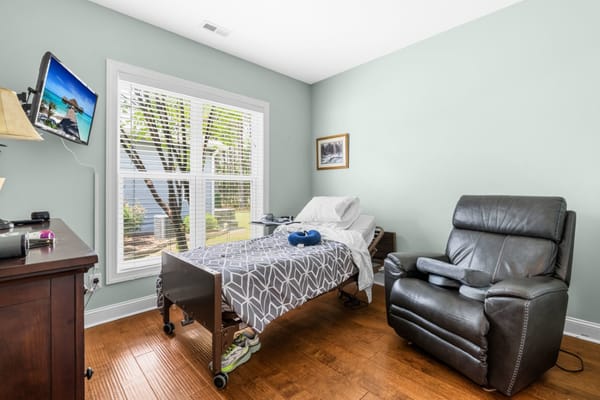 A well-furnished resident room with a view