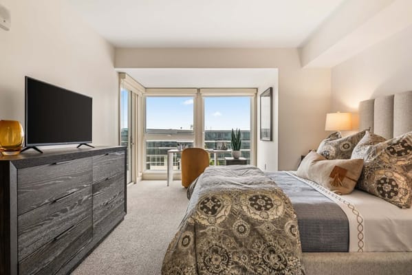 A well-furnished resident room with a view