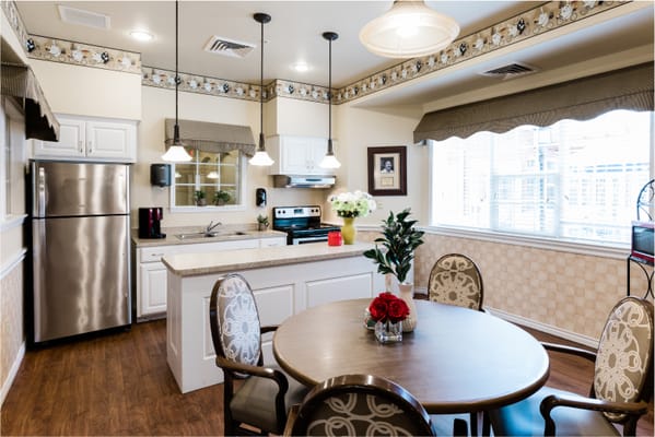 Bright kitchen area with table and chairs