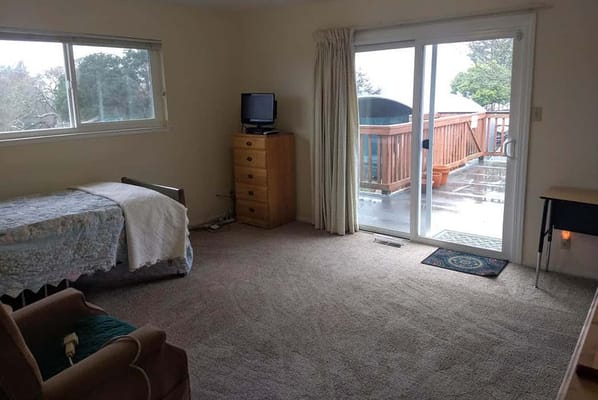 Bright, spacious private resident room with balcony access